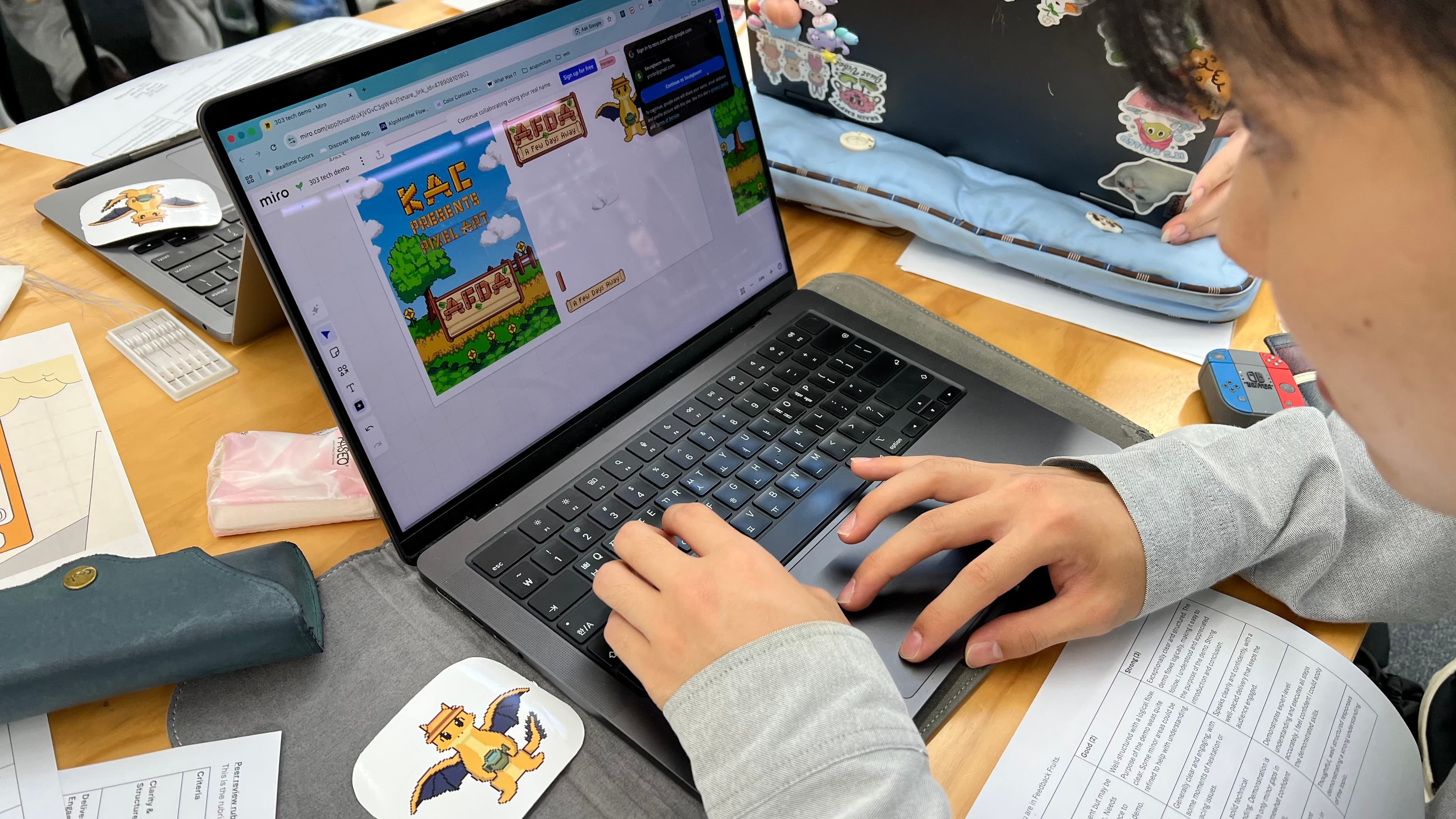 Participating in Harrison's pixel art activity